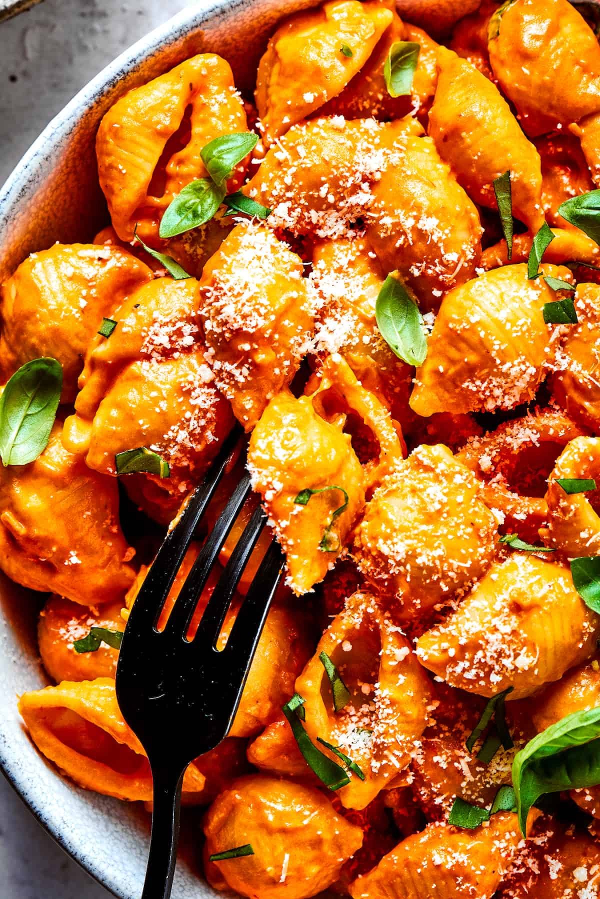 A fork in a bowl of Gigi Hadid pasta.