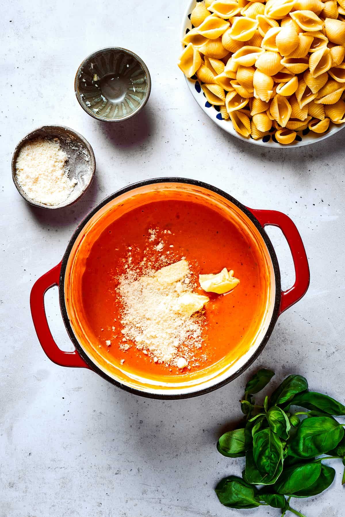 Parmesan added to vodka sauce.