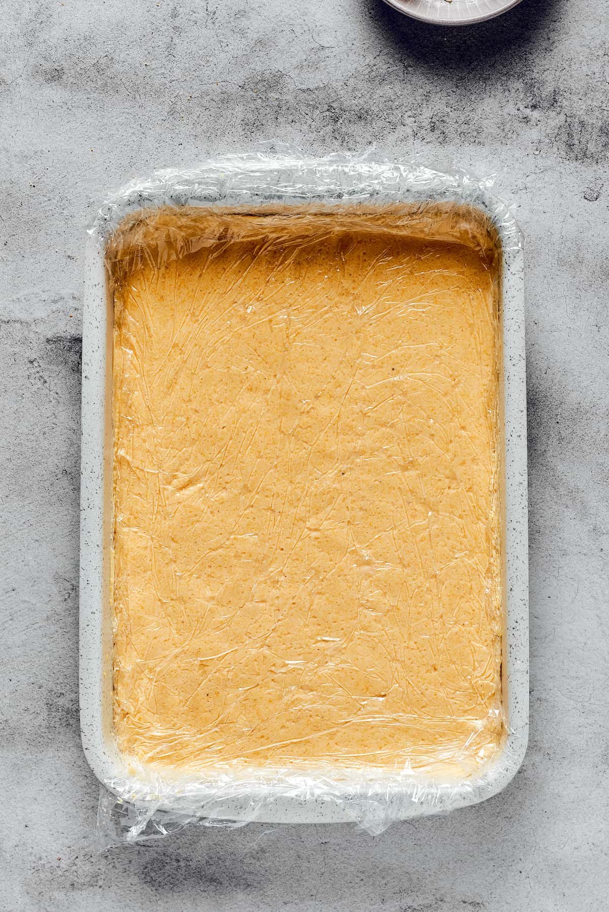 A baking dish with gnocchi dough inside.