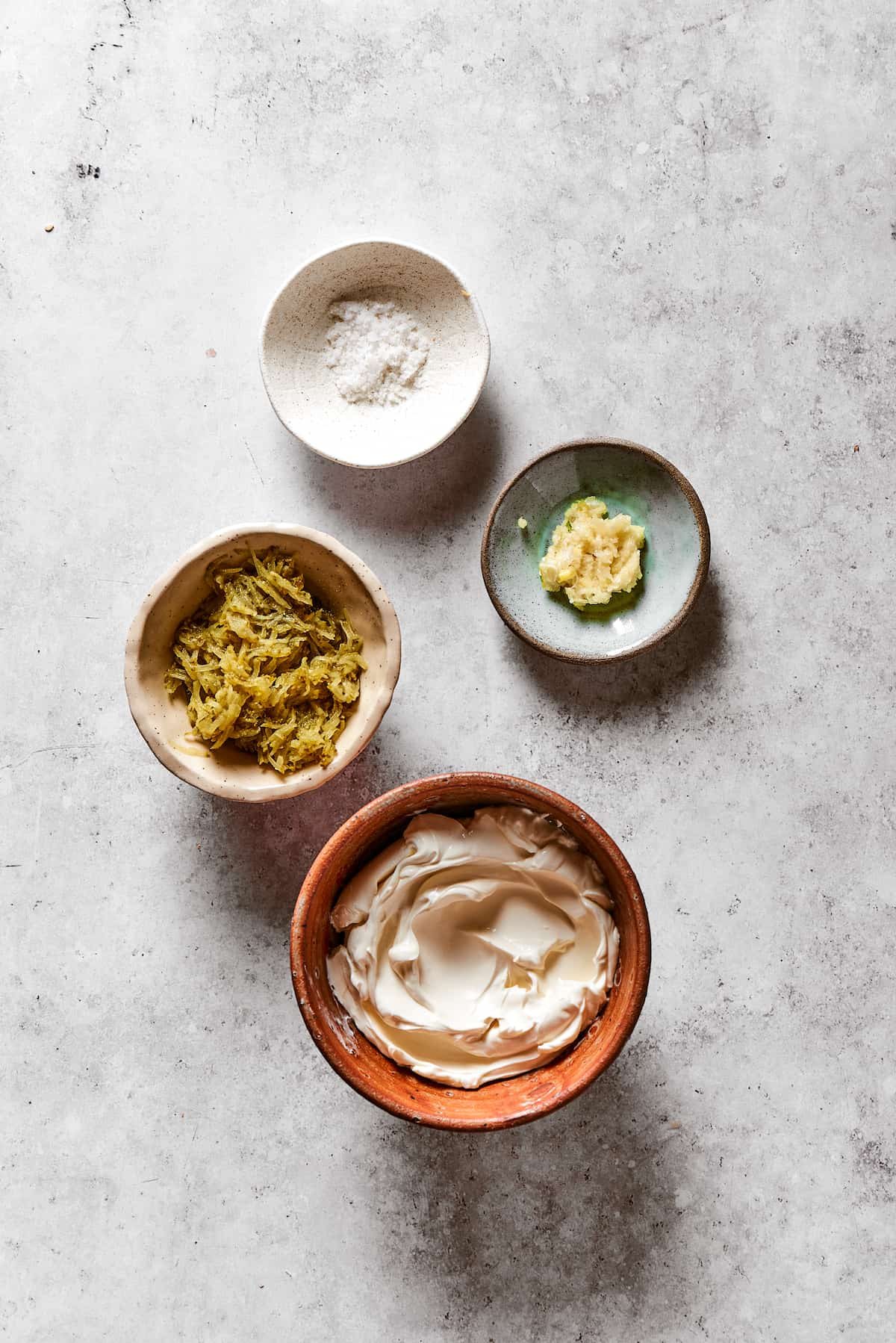 Salt, garlic, cream cheese, chopped pickles.