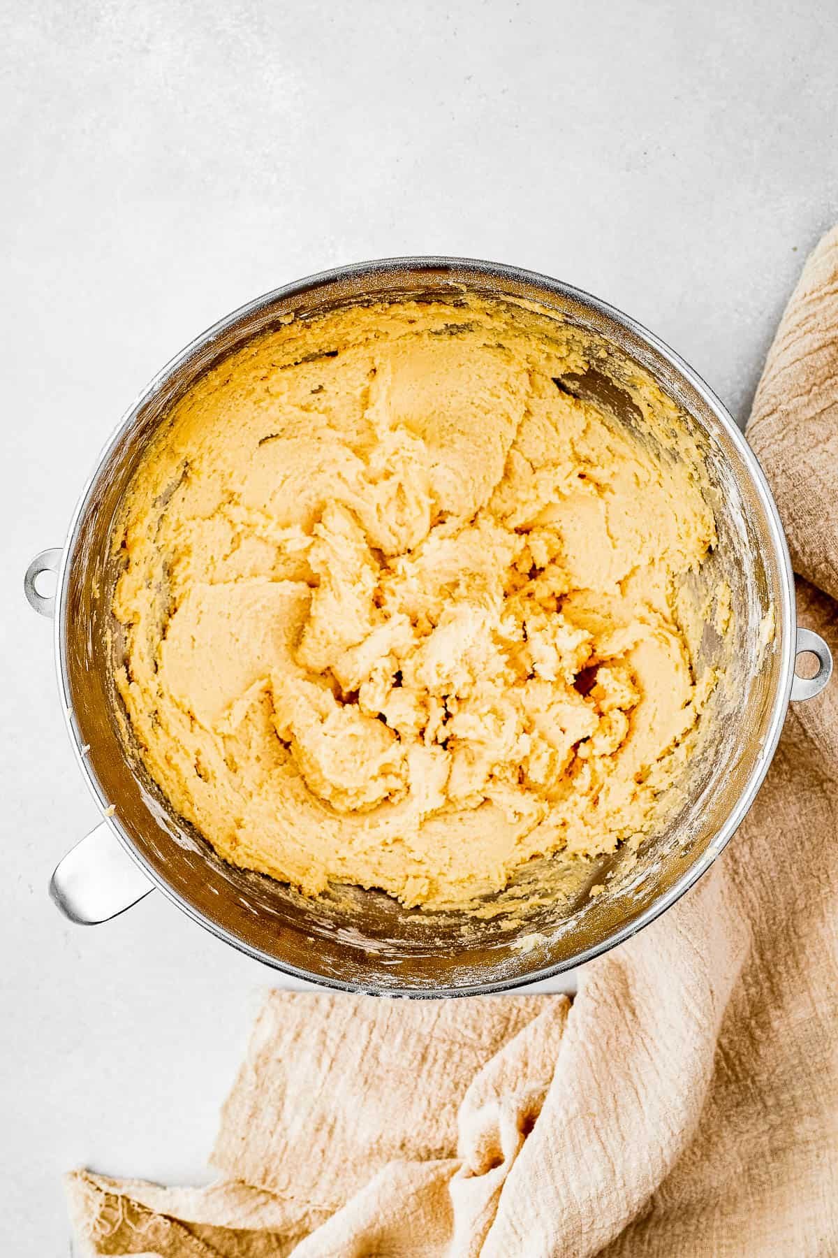 Overhead shot of a mixing bowl full of cookie dough.