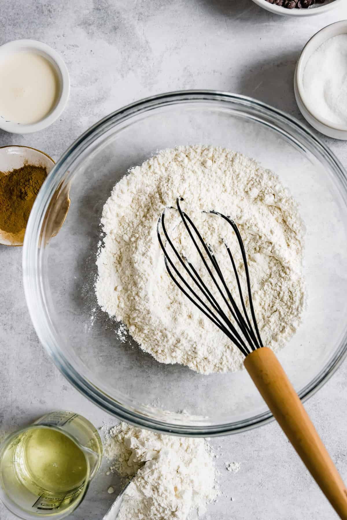 A Glass Bowl Filled with the Combined Dry Ingredients for Homemade Churros