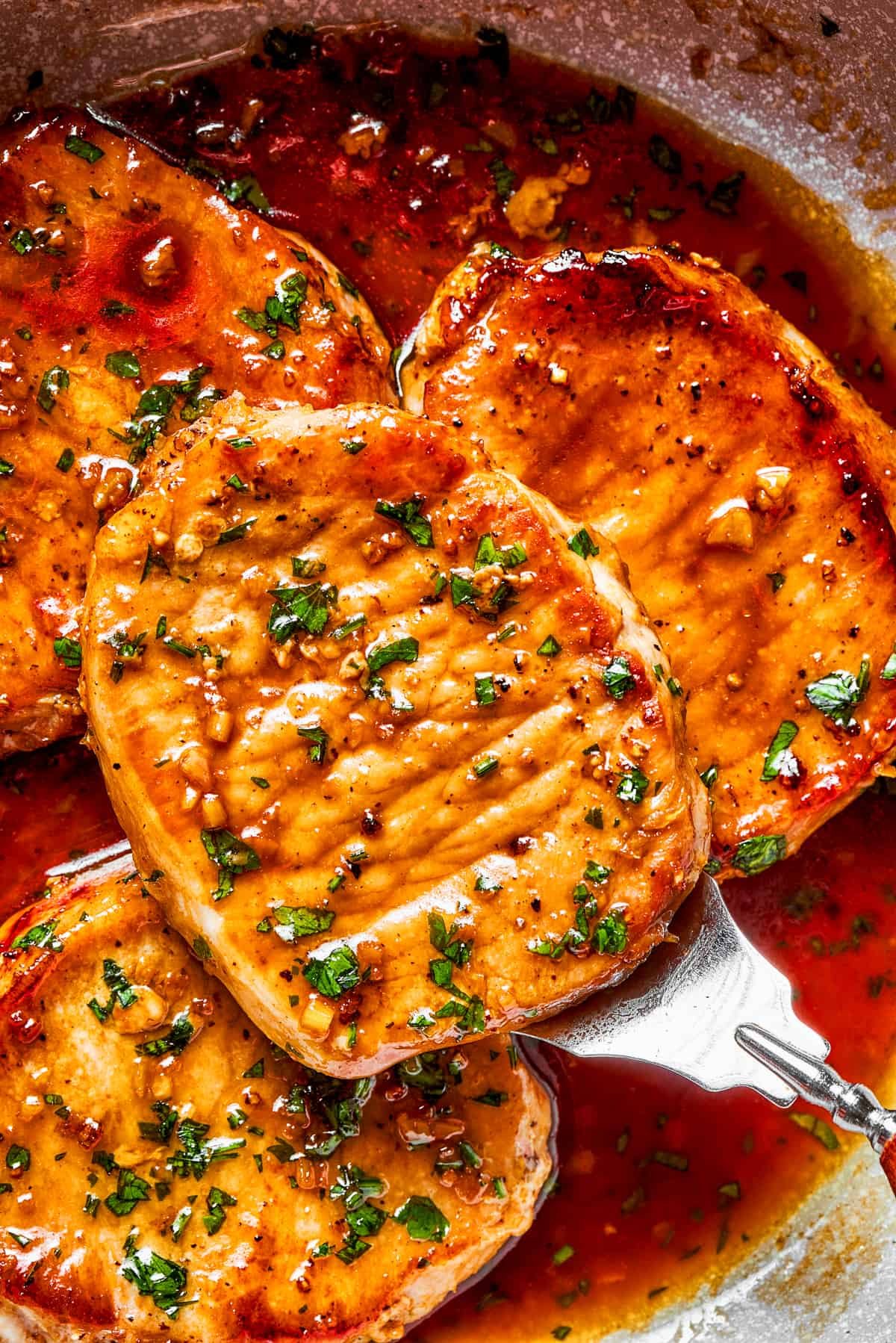 Up close honey garlic pork chops.