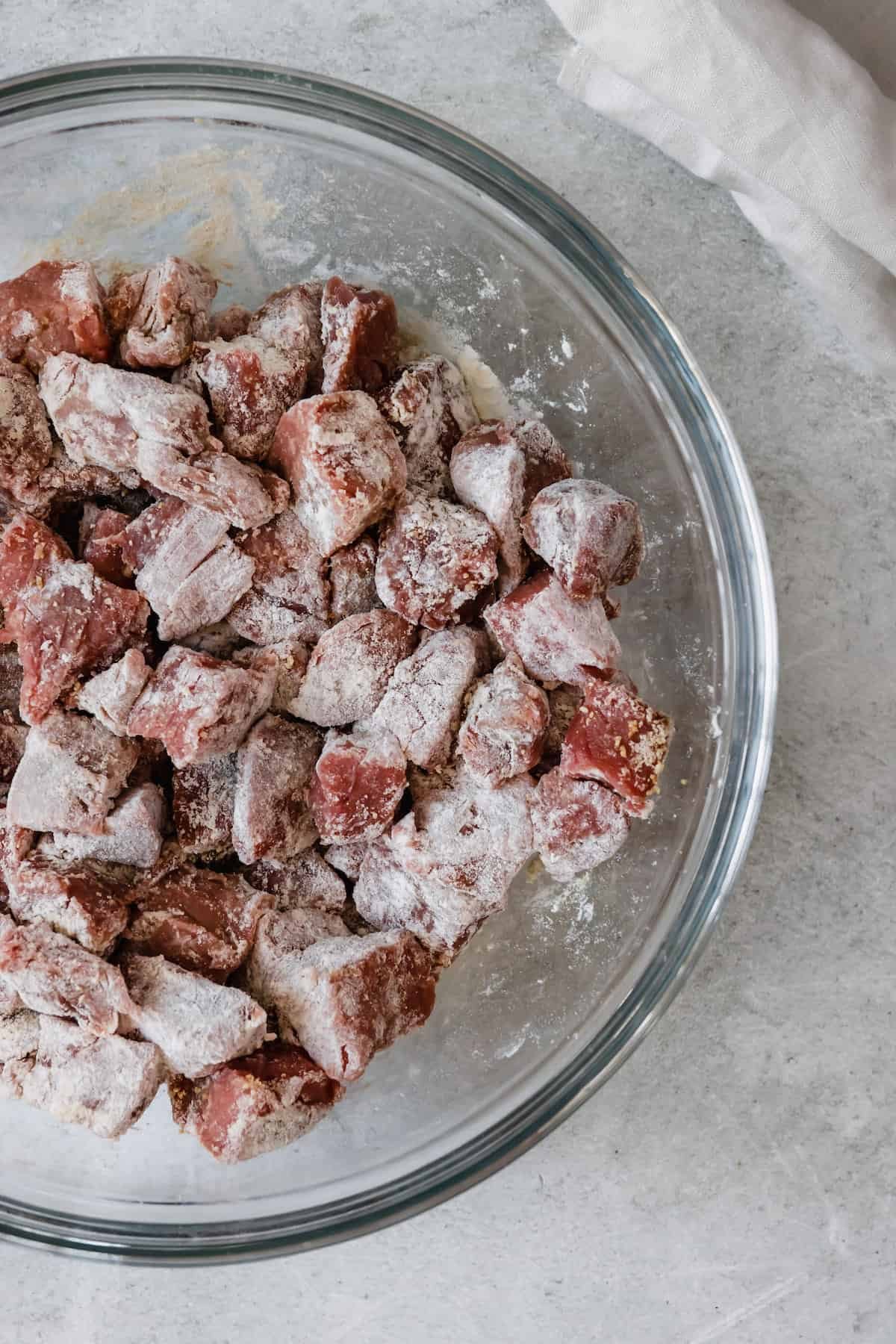 Cubes of Beef Coated in the Flour Mixture