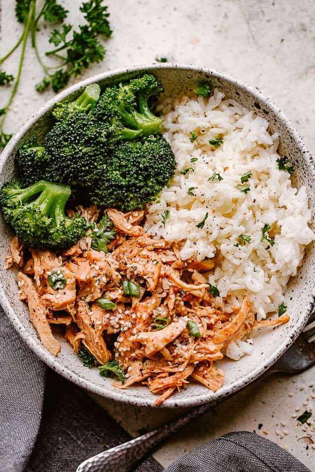 A bowl of Instant Pot honey garlic chicken rice and broccoli