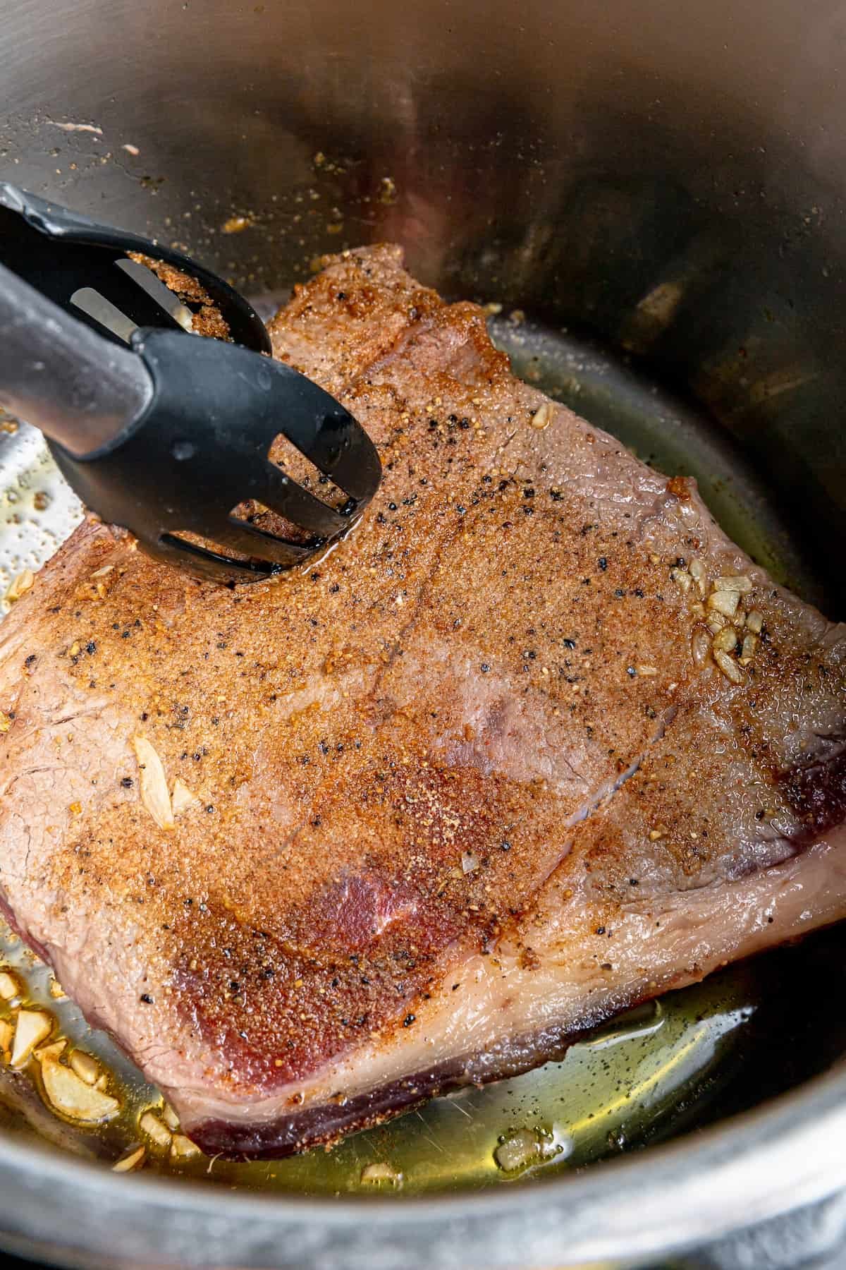 Steak and tongs