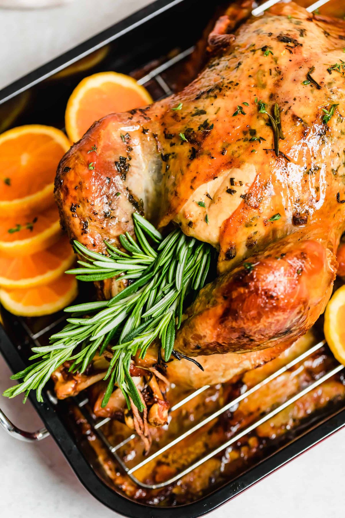 Roasted turkey stuffed with fresh rosemary.
