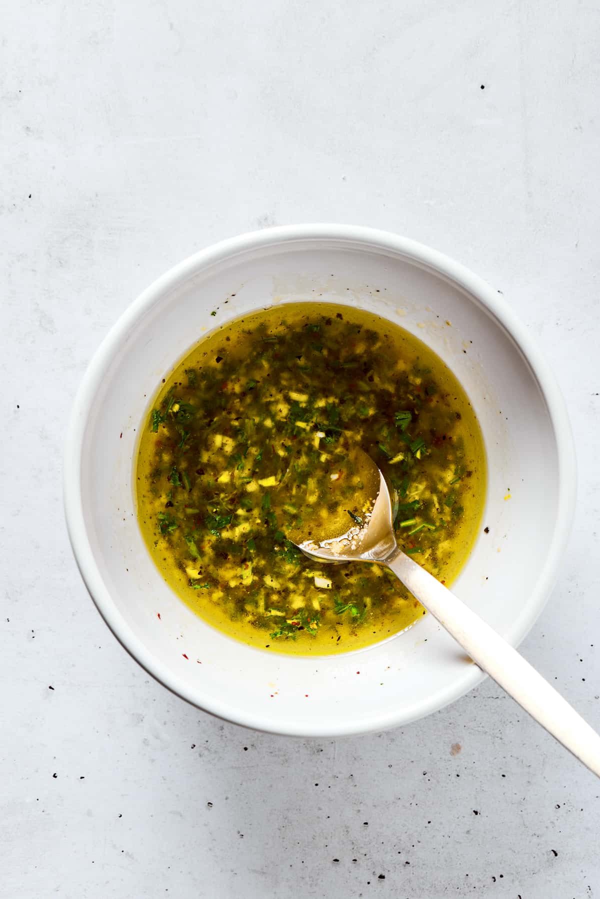 Mixing marinade in a bowl.