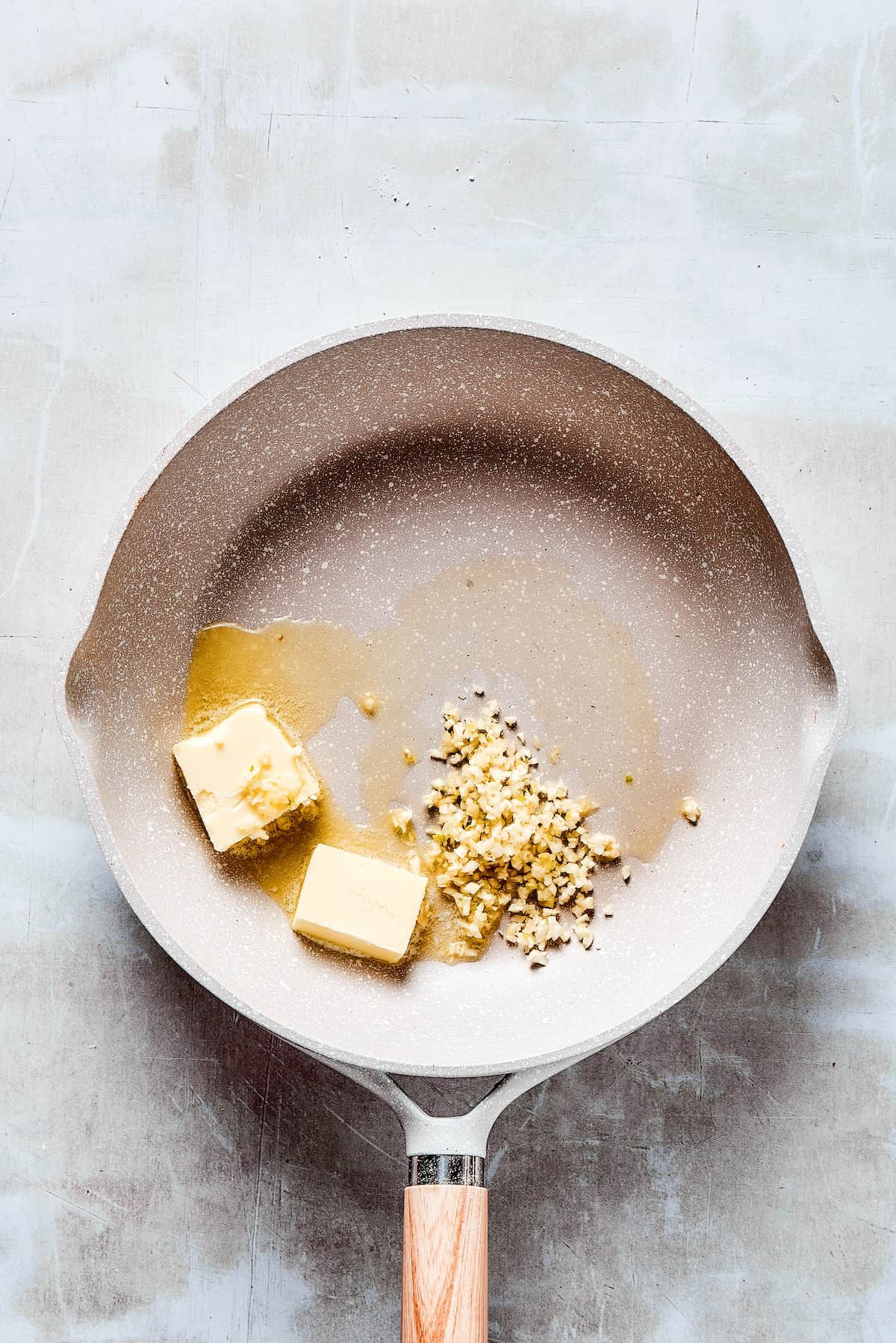 Garlic and butter in a skillet.