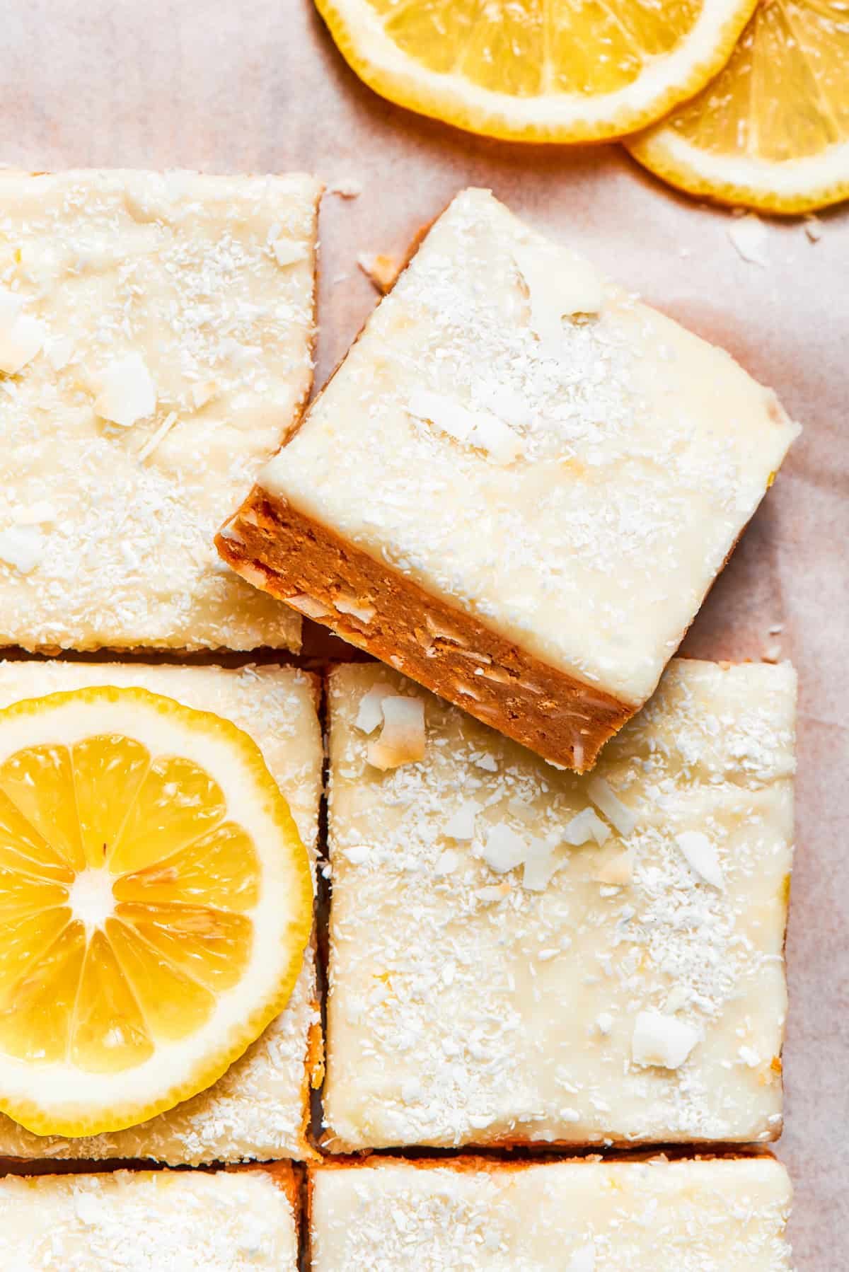 A square of lemon slice on top of other lemon slices.