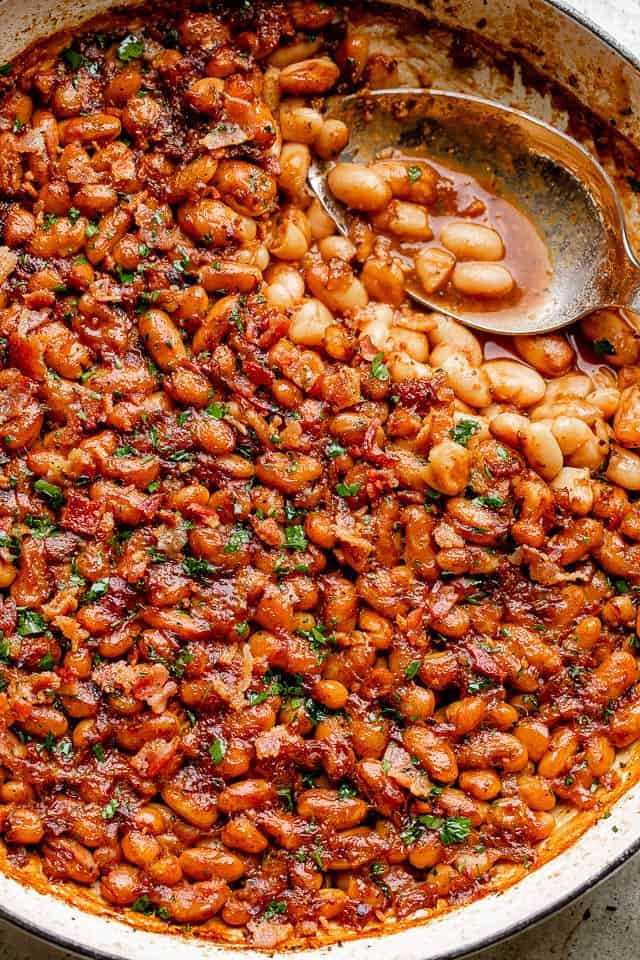 Pot of homemade maple bacon baked beans.