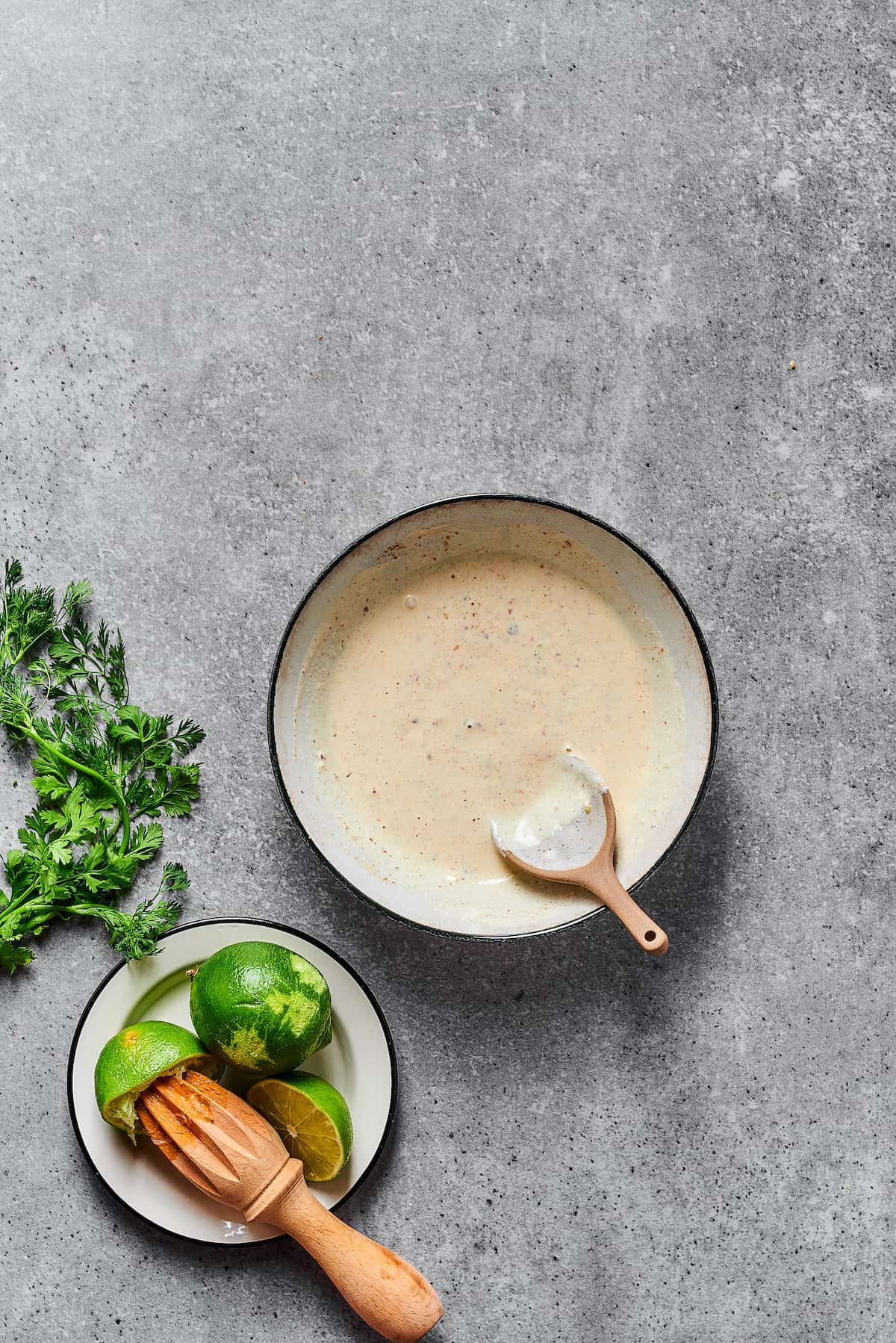 Creamy salad dressing in a bowl.