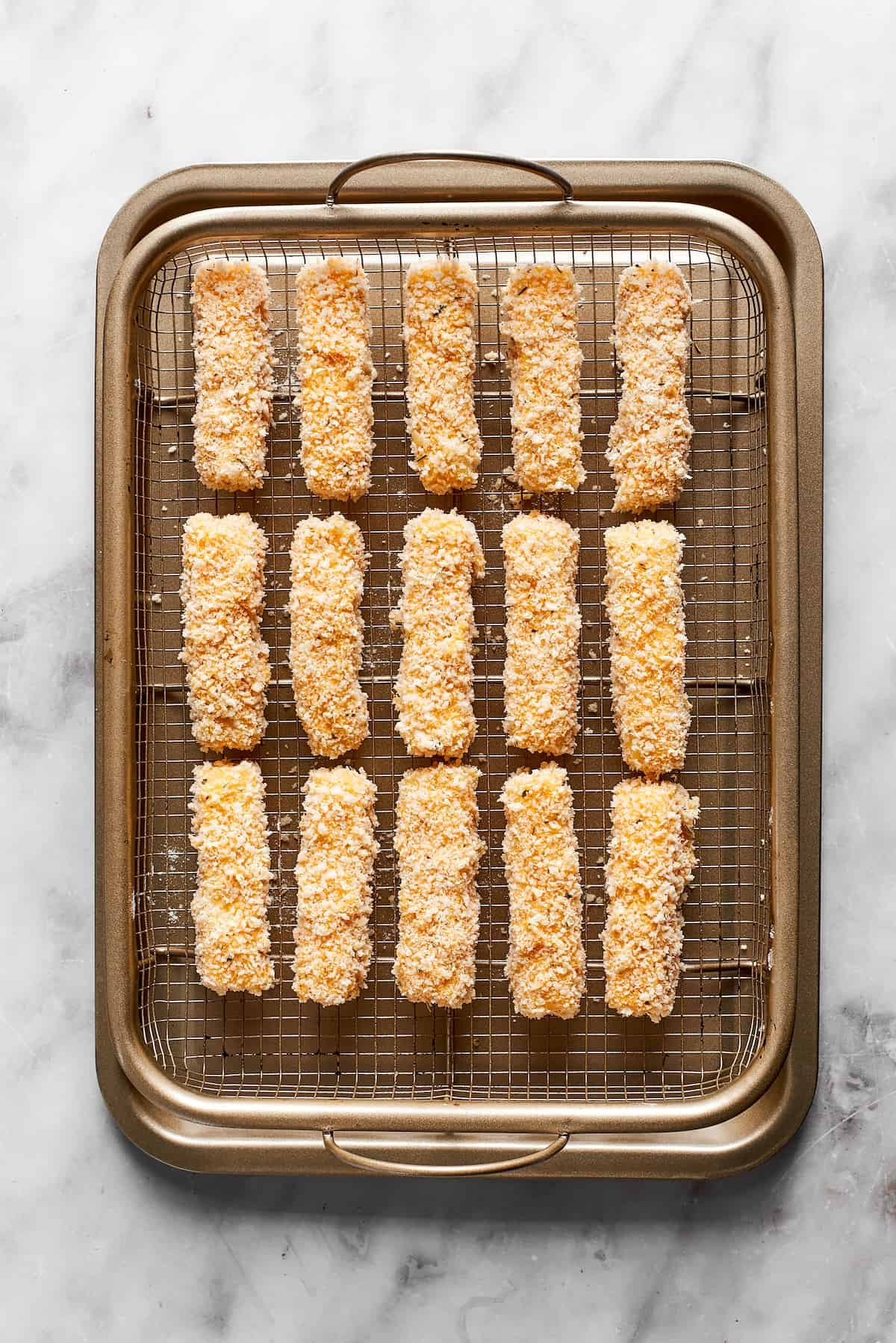 The mozzarella sticks are shown on a rack.