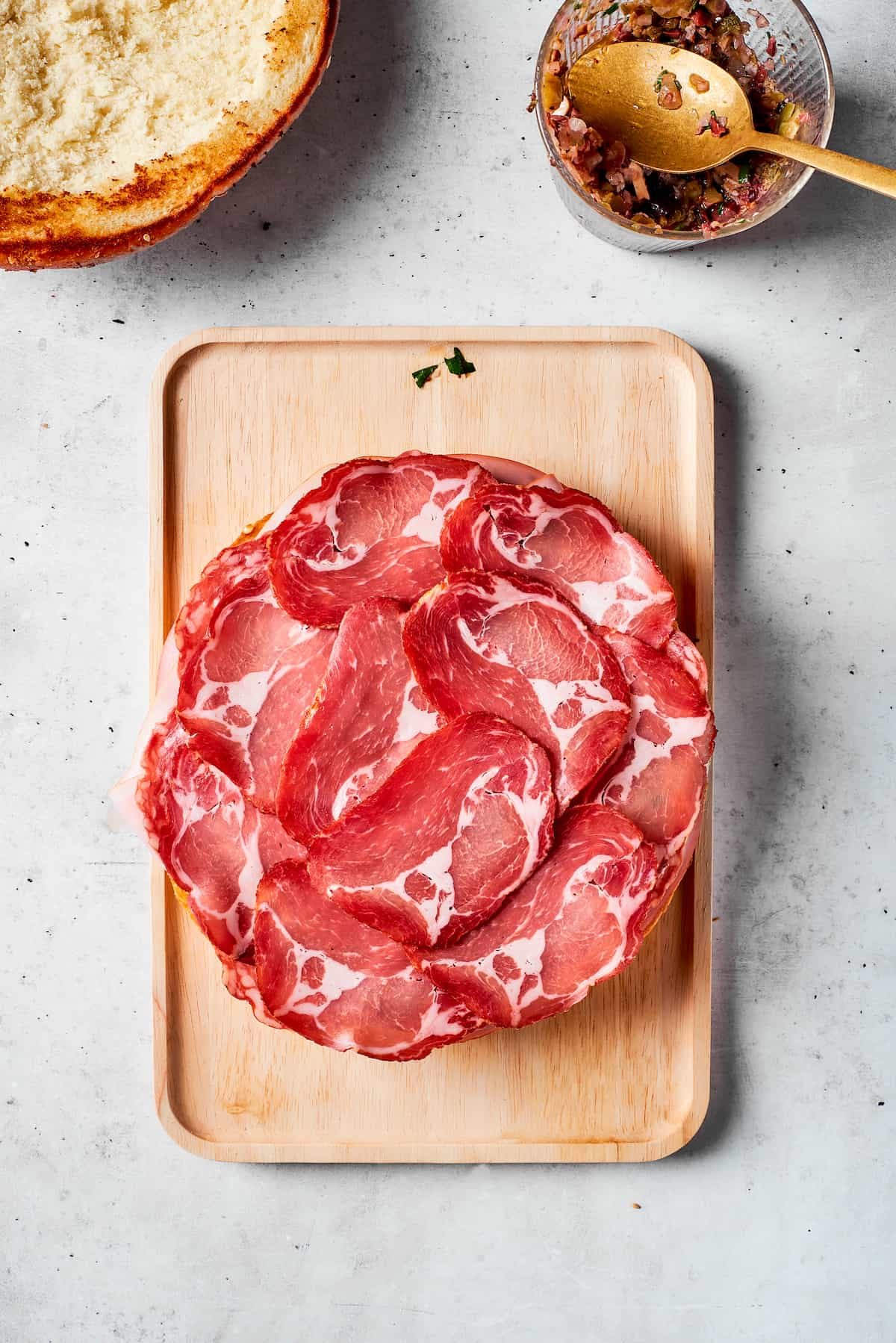 Deli ham tops the pile.