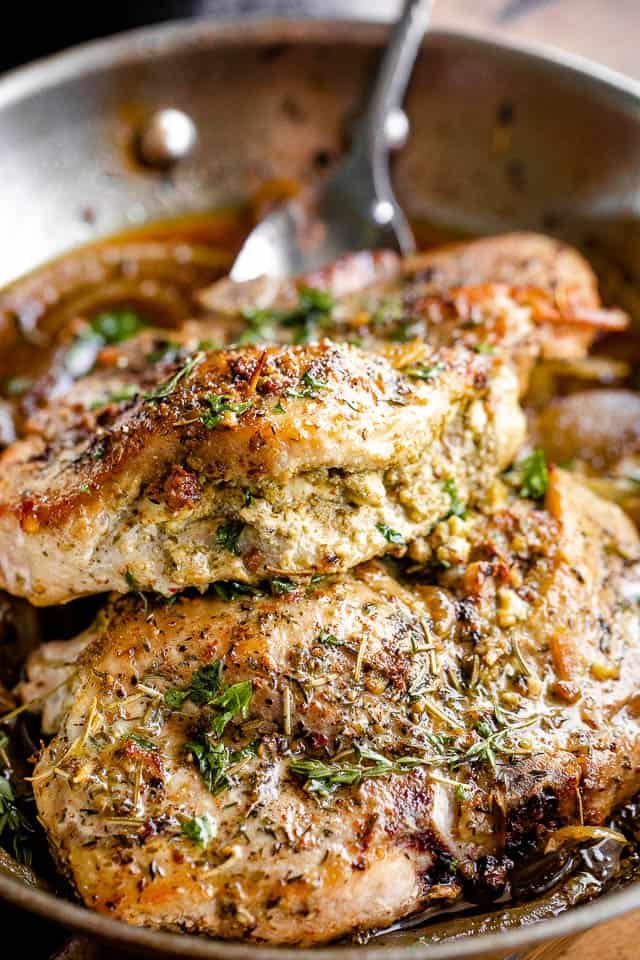 side shot of pesto filling stuffed in pork chops