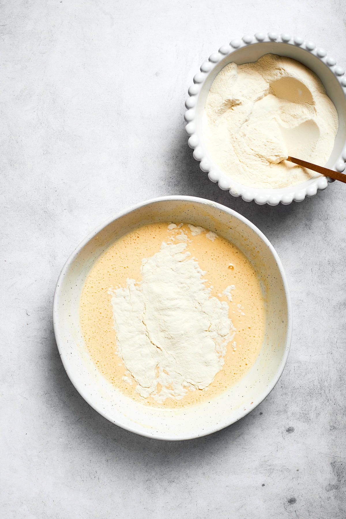 The flour mixture is added to the wet mixture.