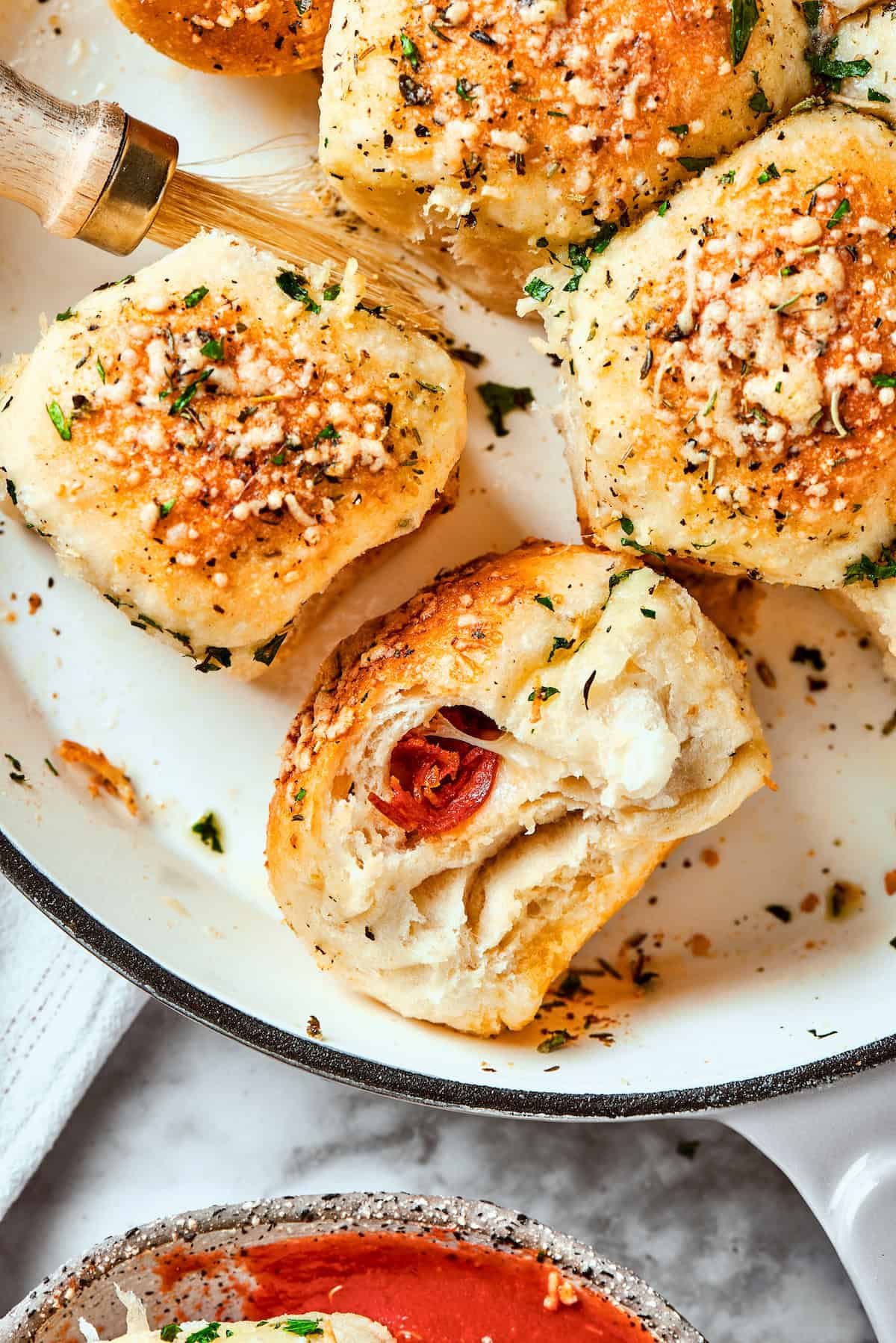 A few pizza bites are shown in a skillet.