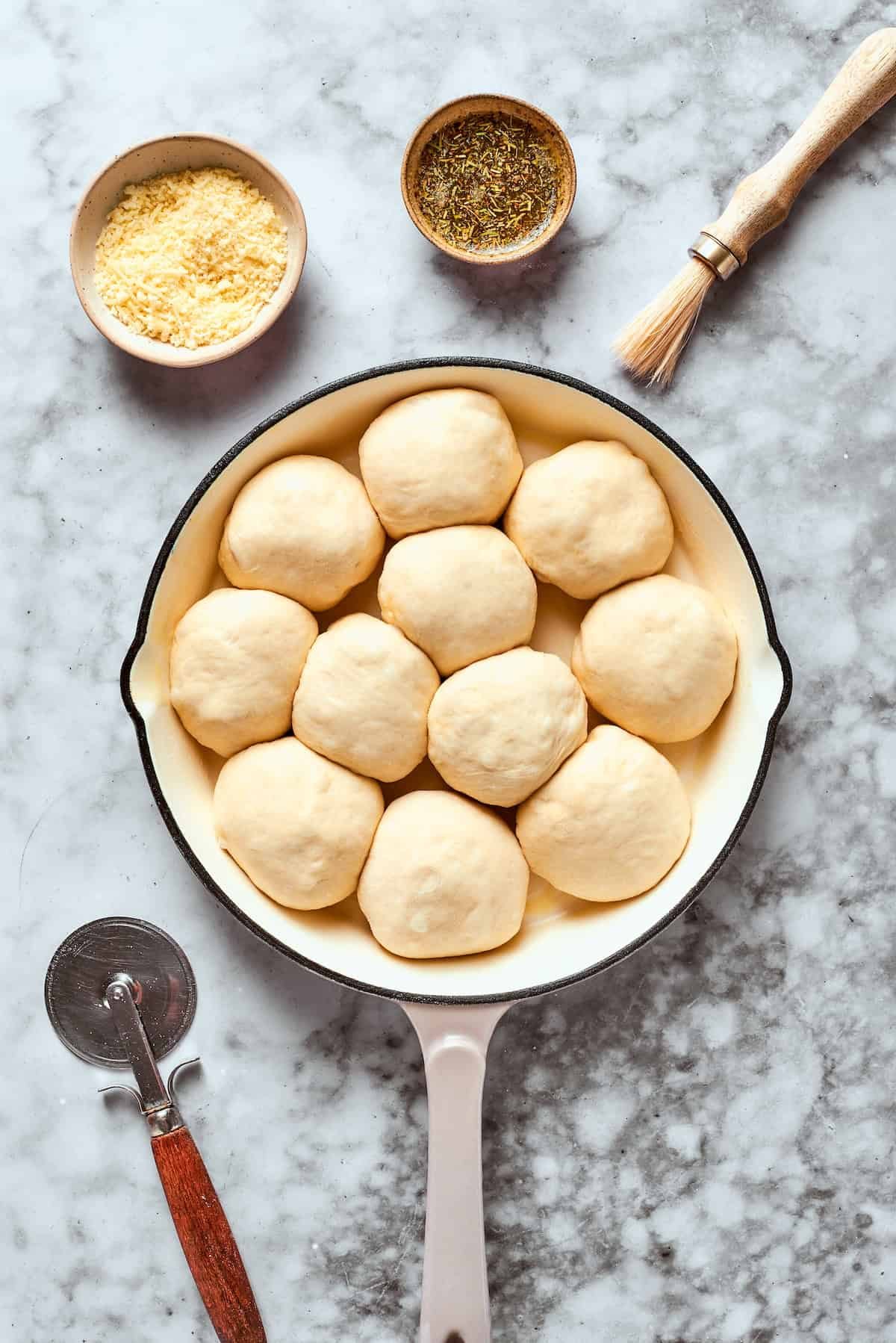 The 12 pizza bites are placed in a skillet.