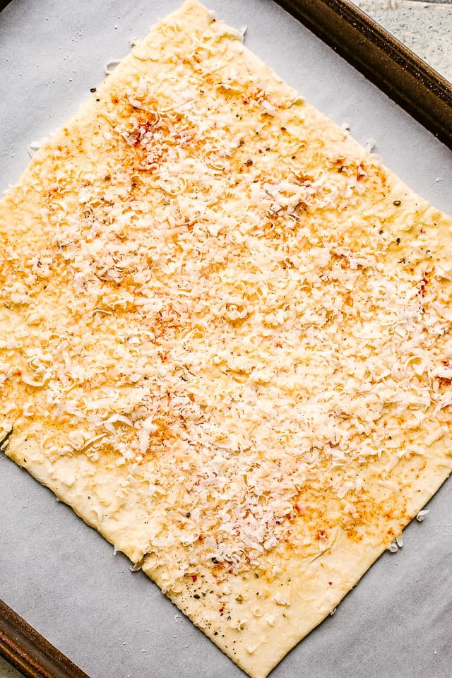 Puff pastry layered with cheese and spices.
