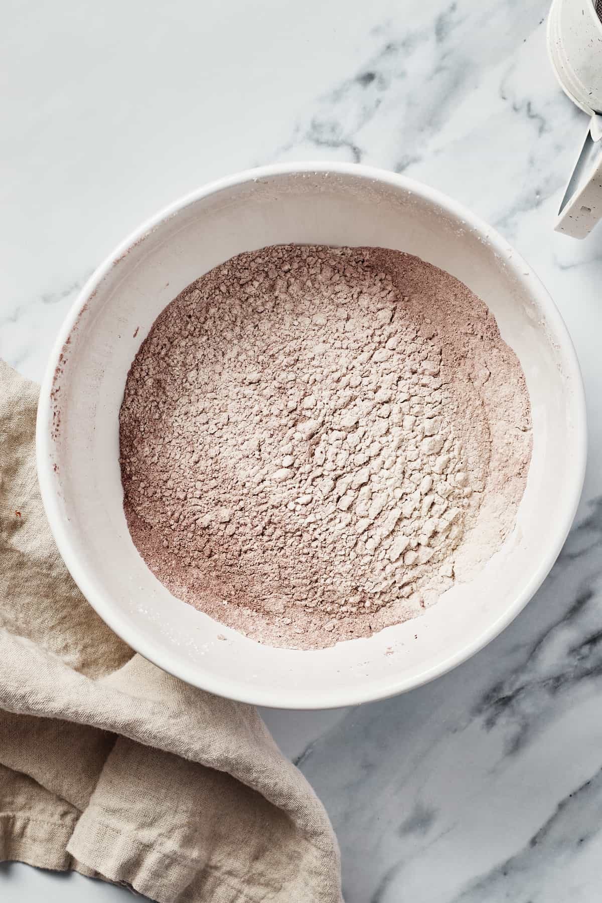 Dry ingredients sifted together in a mixing bowl.
