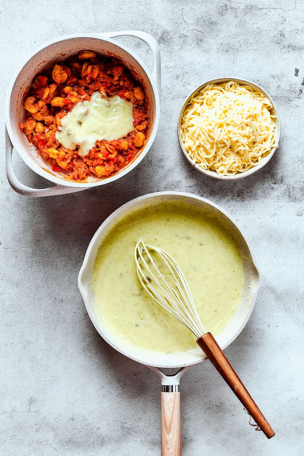 Enchilada filling, cheese, and sauce.