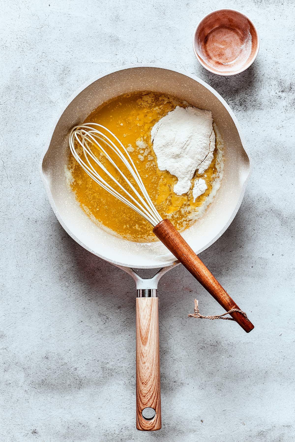 Making a roux in a skillet.
