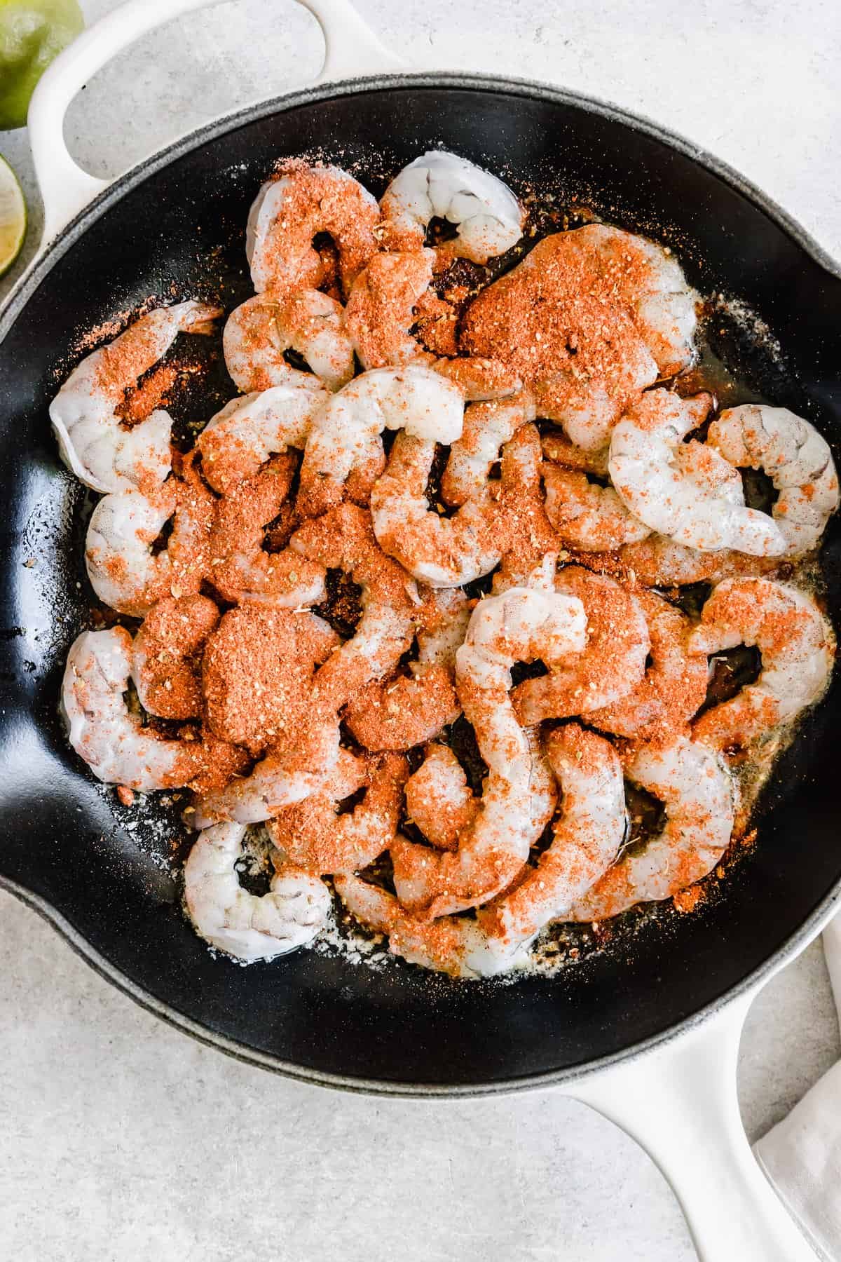 Seasoned Shimp Inside of a Metal Skillet