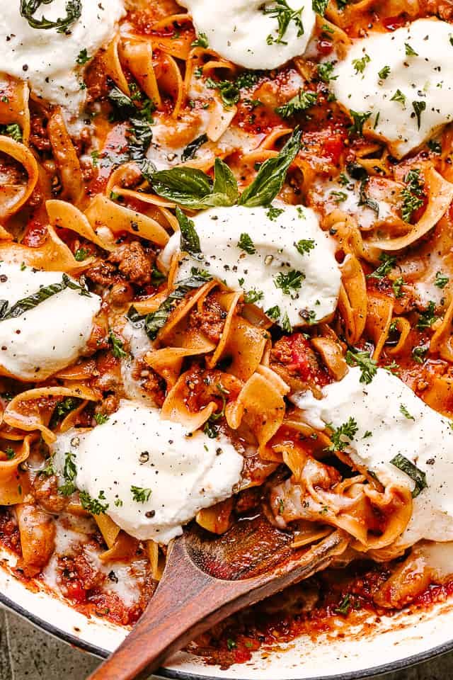 Skillet Lasagna with cheese and fresh herbs