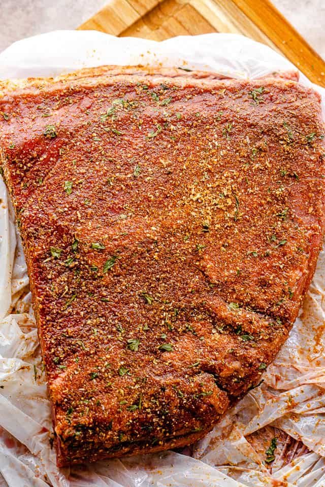 top shot of seasoned raw beef brisket