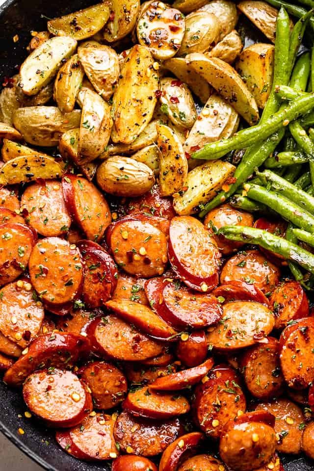 andouille sausages and quartered yukon potatoes topped with pepper flakes