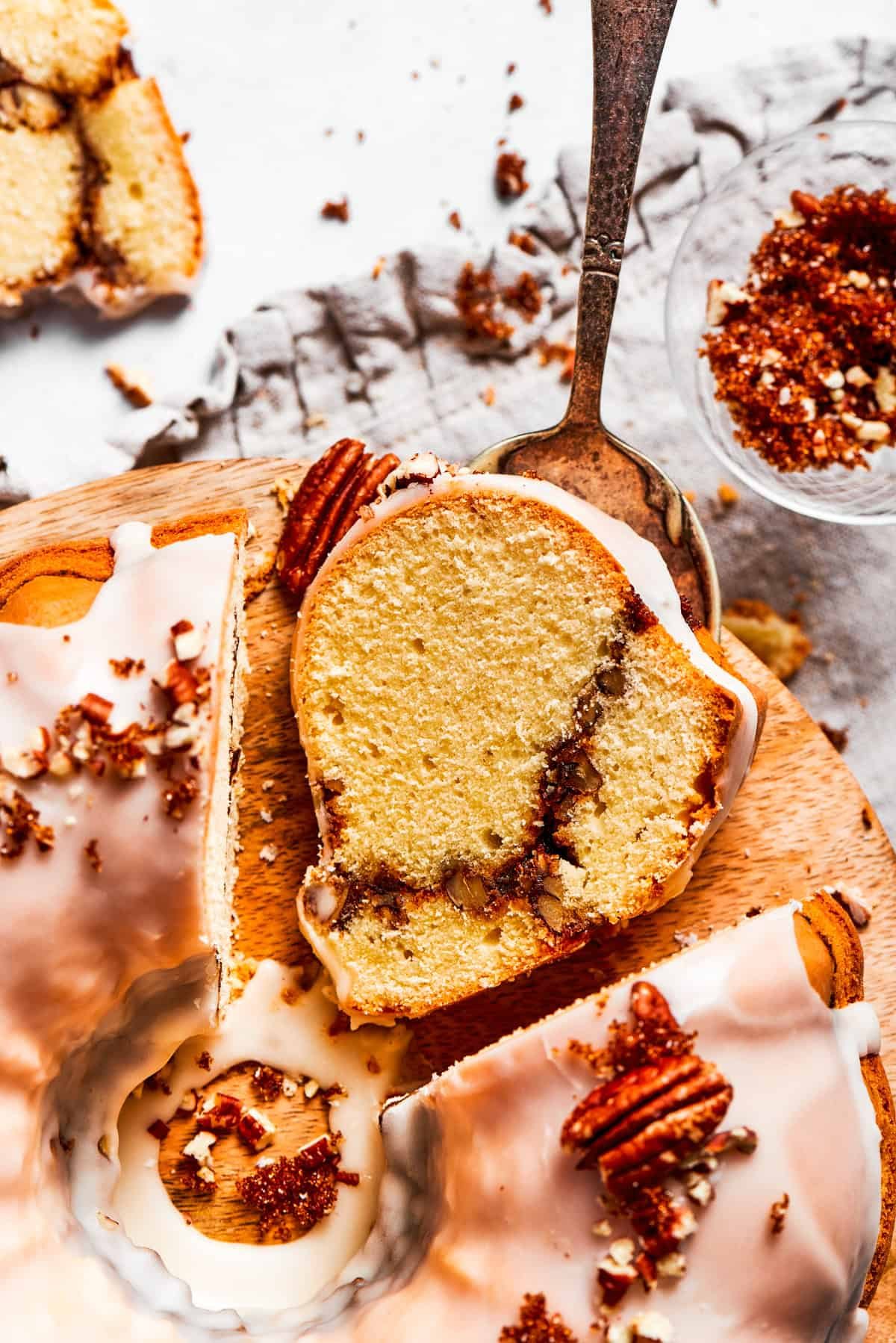 A slice of sock it to me cake with the cinnamon sugar ribbon across it.