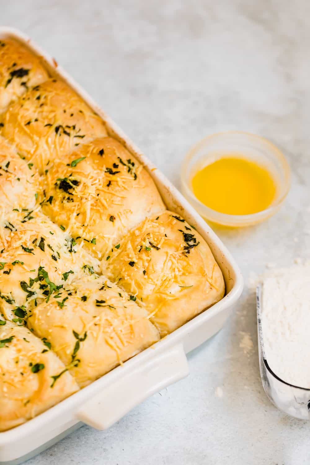Golden-Brown Soft Parmesan Dinner Rolls in a Large Pan