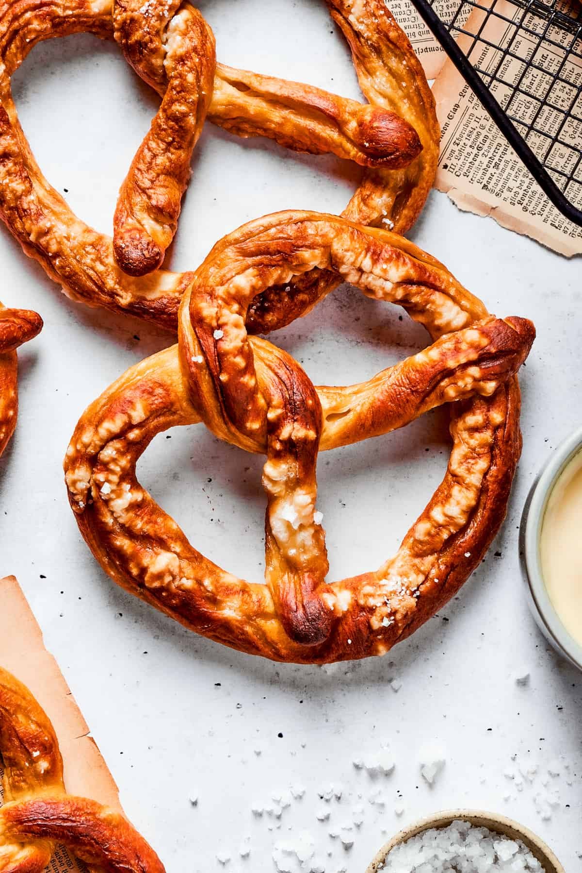 A top down shot of a baked soft pretzel.