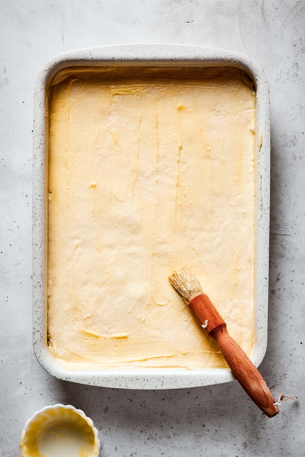 Cinnamon-spiced Sopapilla Cheesecake with fluffy crescent dough and cream cheese filling is super easy to make, and perfect for any event!