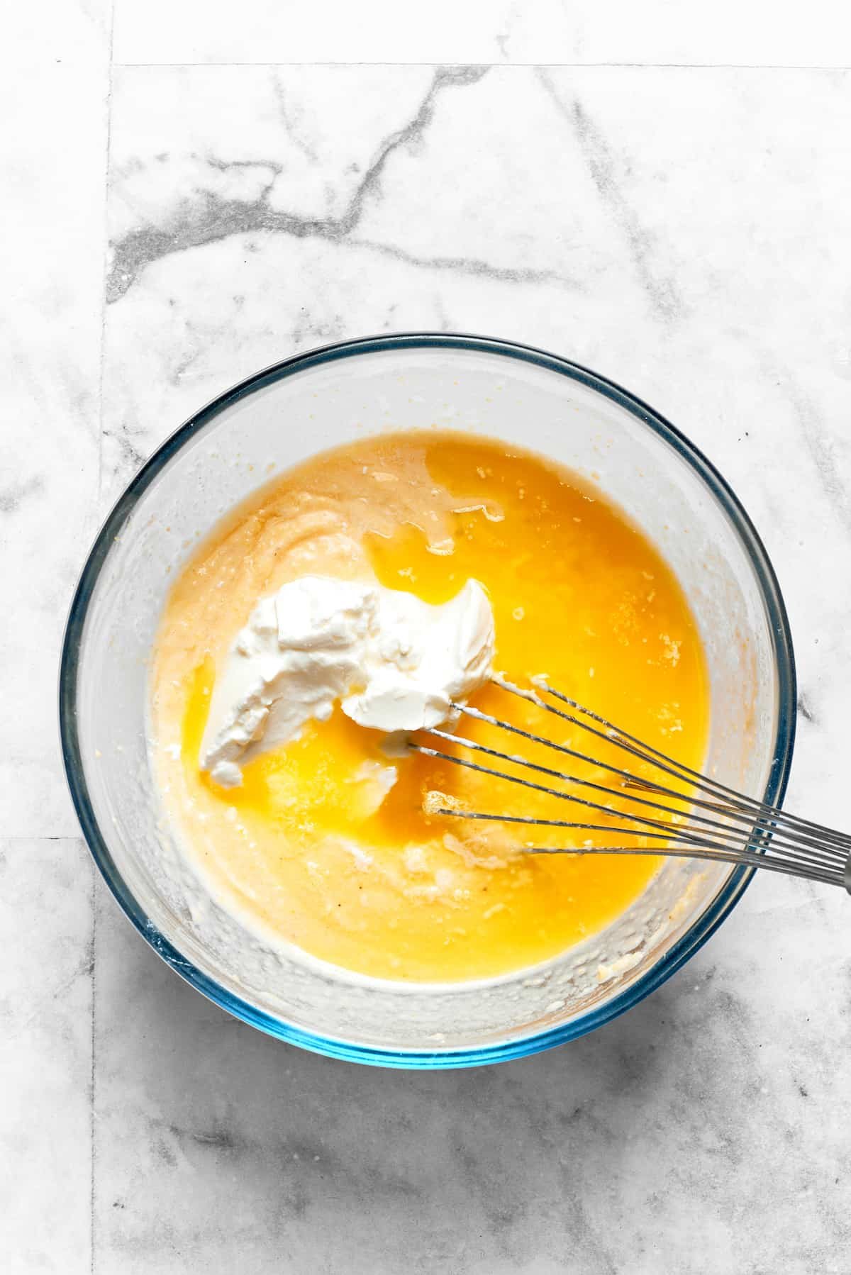 Sour cream is added to spoon bread batter.