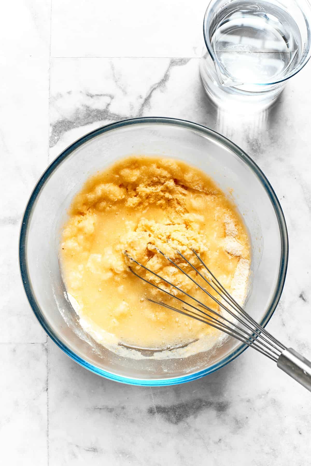 A whisk combines the batter.