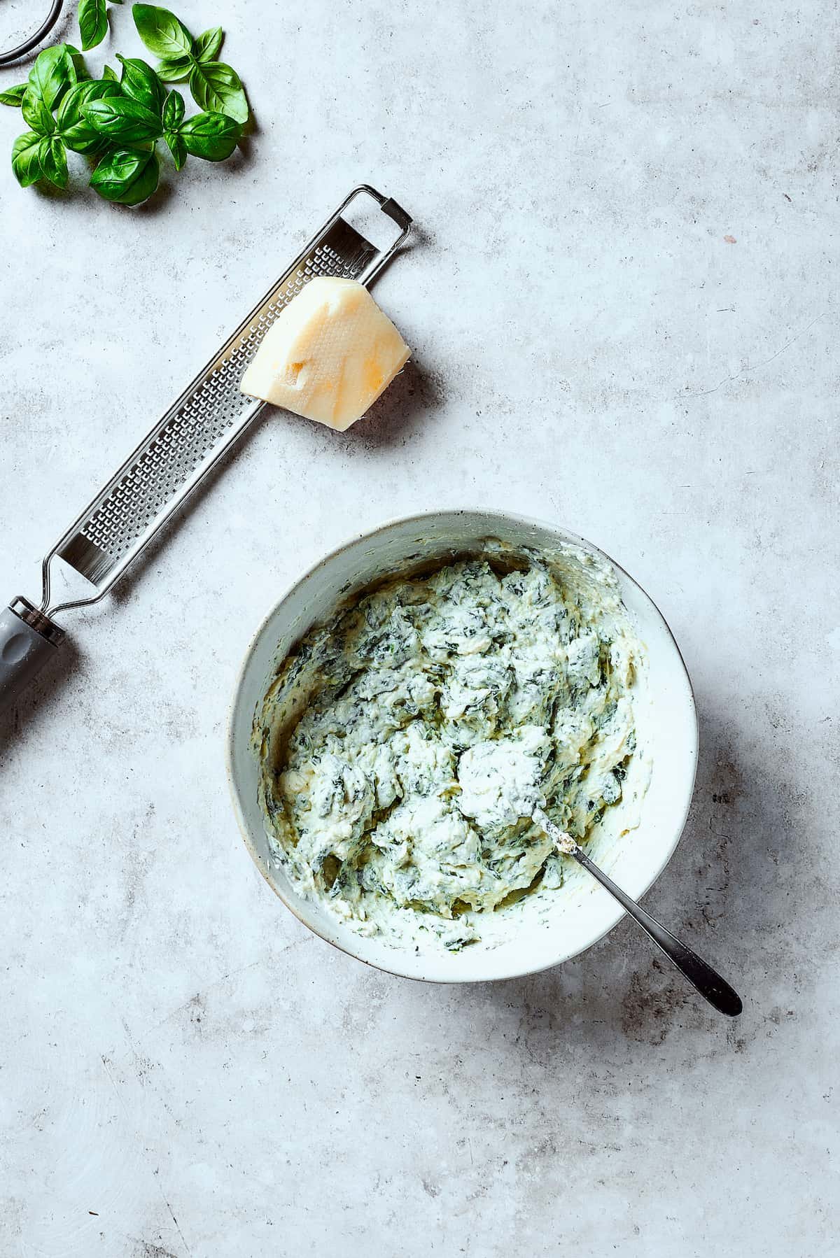 Spinach cheese filling in a bowl.