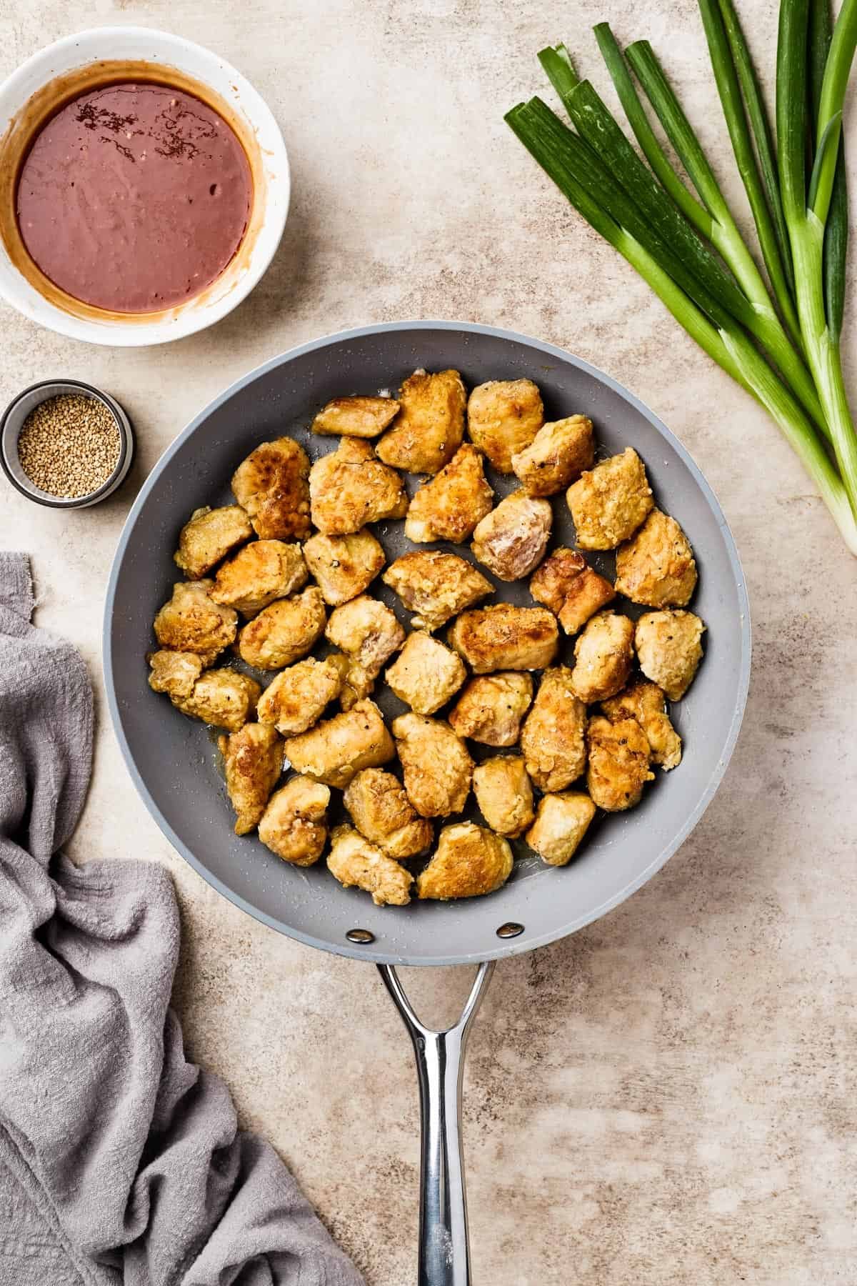 A pan of fried chicken pieces.
