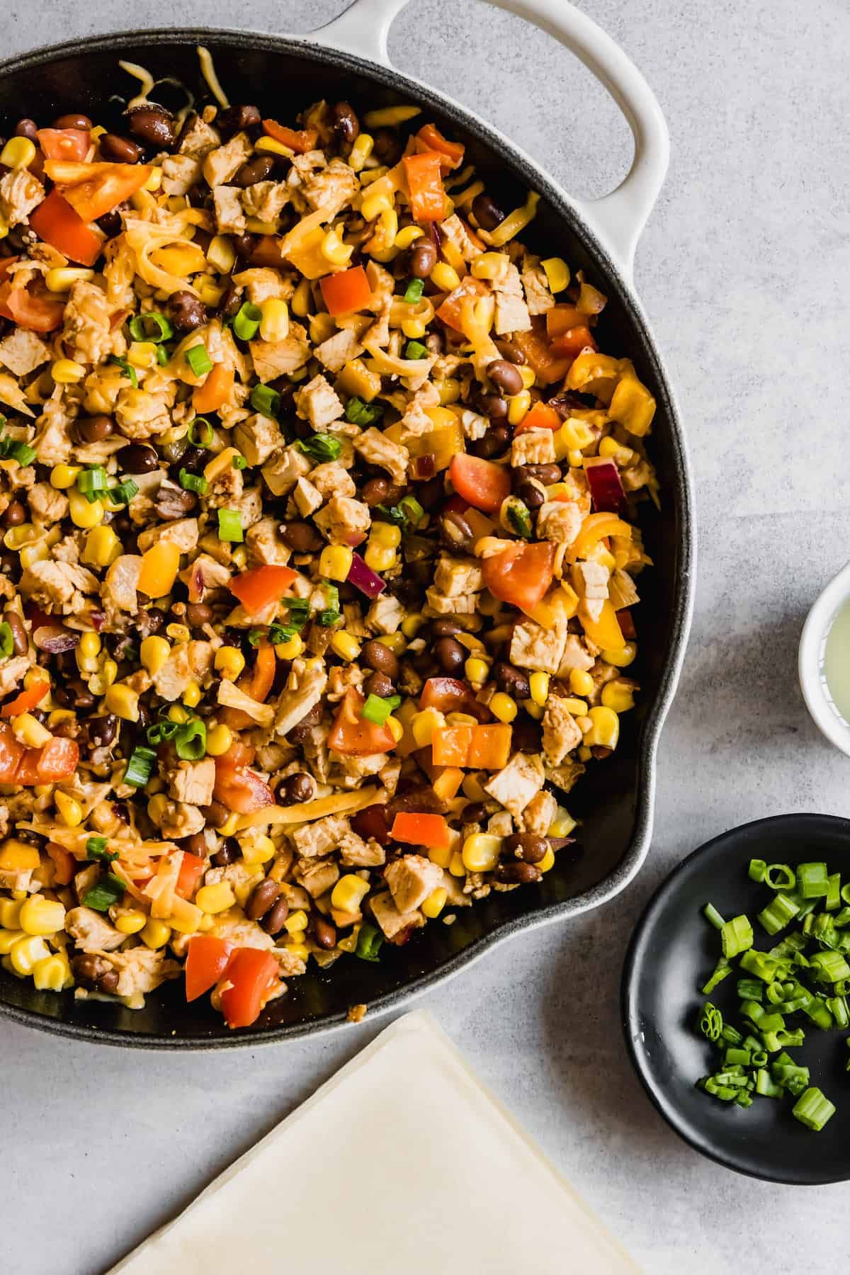 A Metal Skillet Filled with the Chicken and Veggie Egg Roll Filling