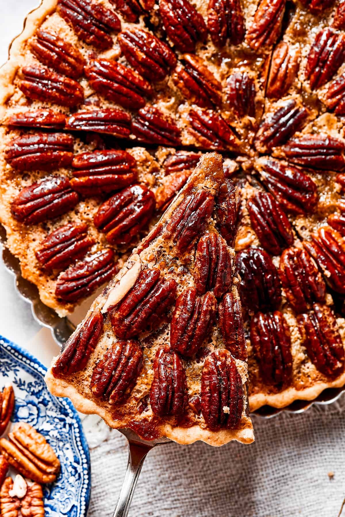 Close-up shot of a slice of pie being lifted out of the pan.