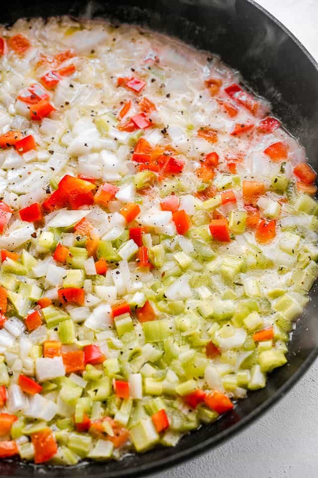 frying diced red peppers and diced celery in butter