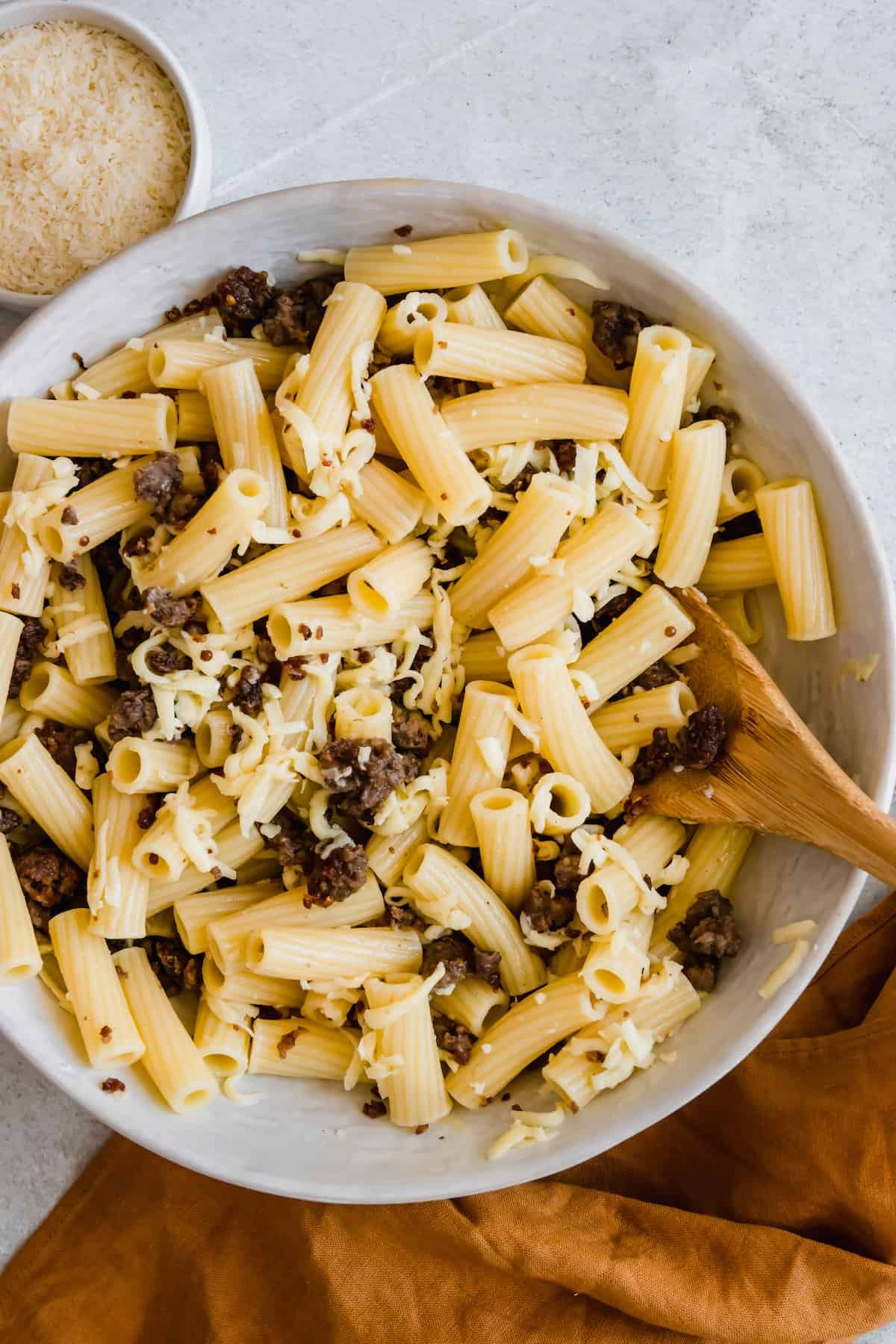 A Bowl of Rigatoni Pasta, Shredded Mozzarella and Bits of Beef