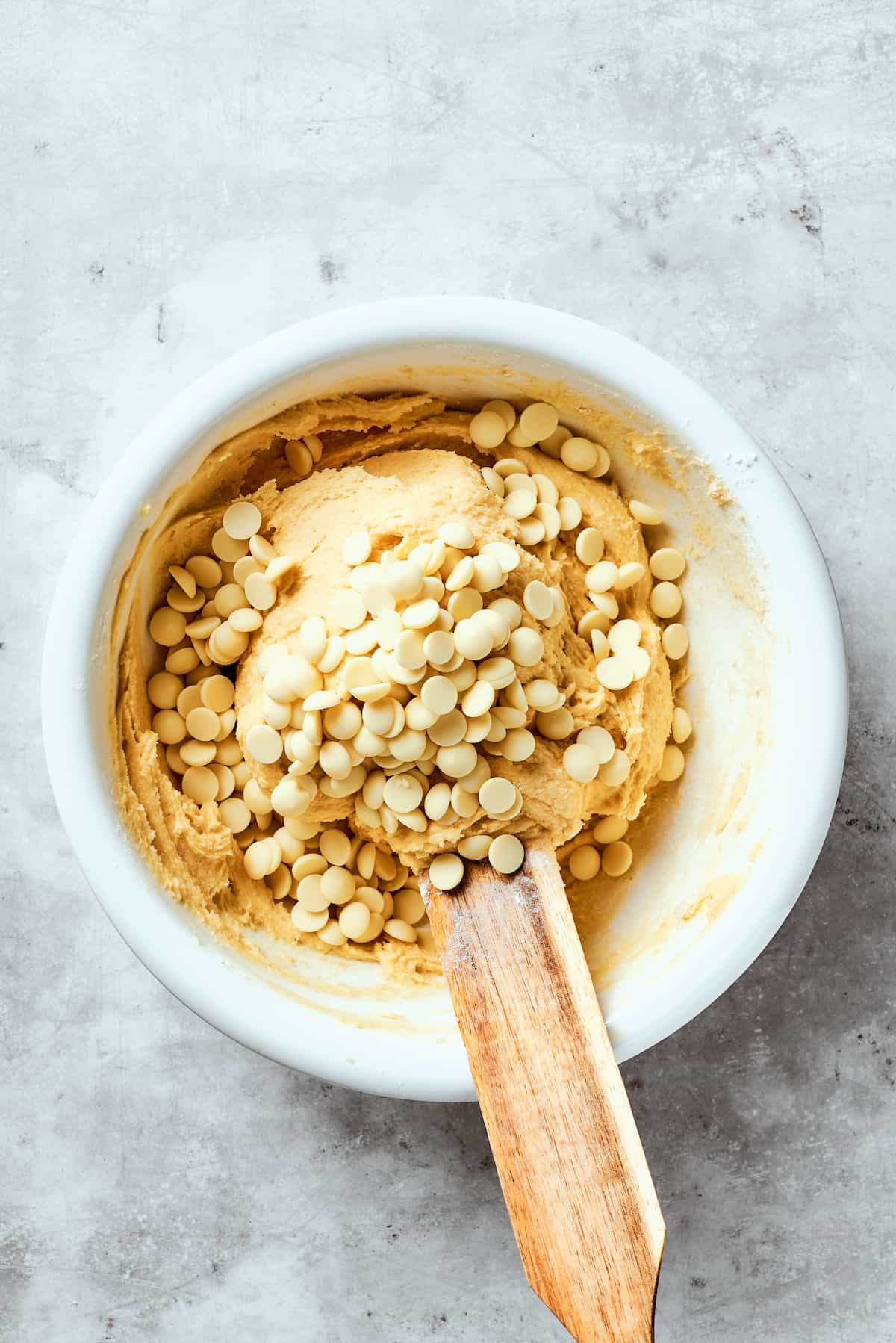 White chocolate chips are added to the dough.