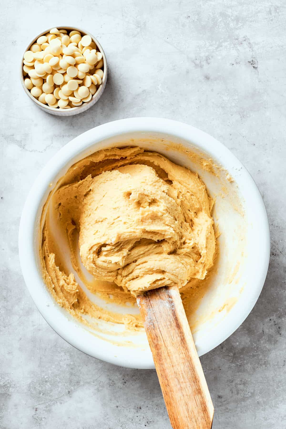 The cookie dough is stirred together.