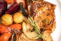 Golden Baked Pork Chops with Spiced Apples and Root Vegetables
