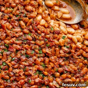Pot of homemade maple bacon baked beans.