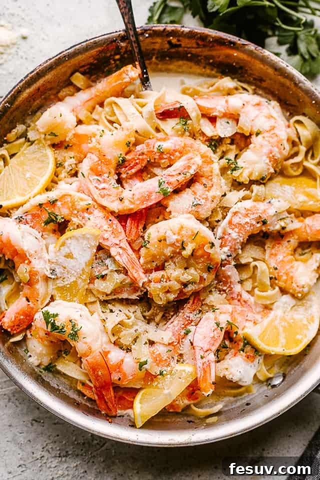 Velvet Shrimp Alfredo 3 Creamy Shrimp Alfredo Pasta in a pan ready to be served
