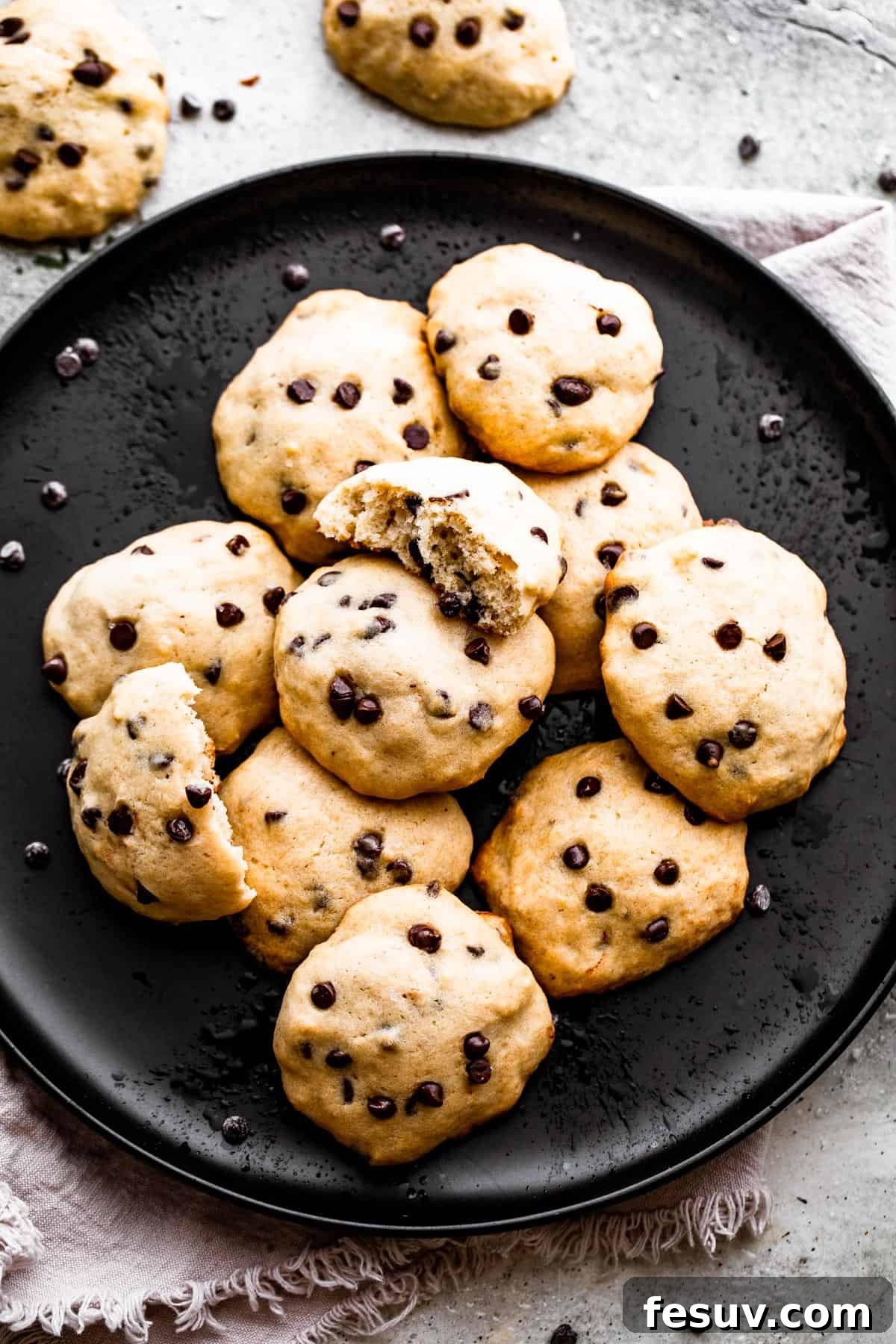 Golden Banana Chocolate Chip Cookies 3 overhead shot of banana chocolate chips cookies served on a black plate.