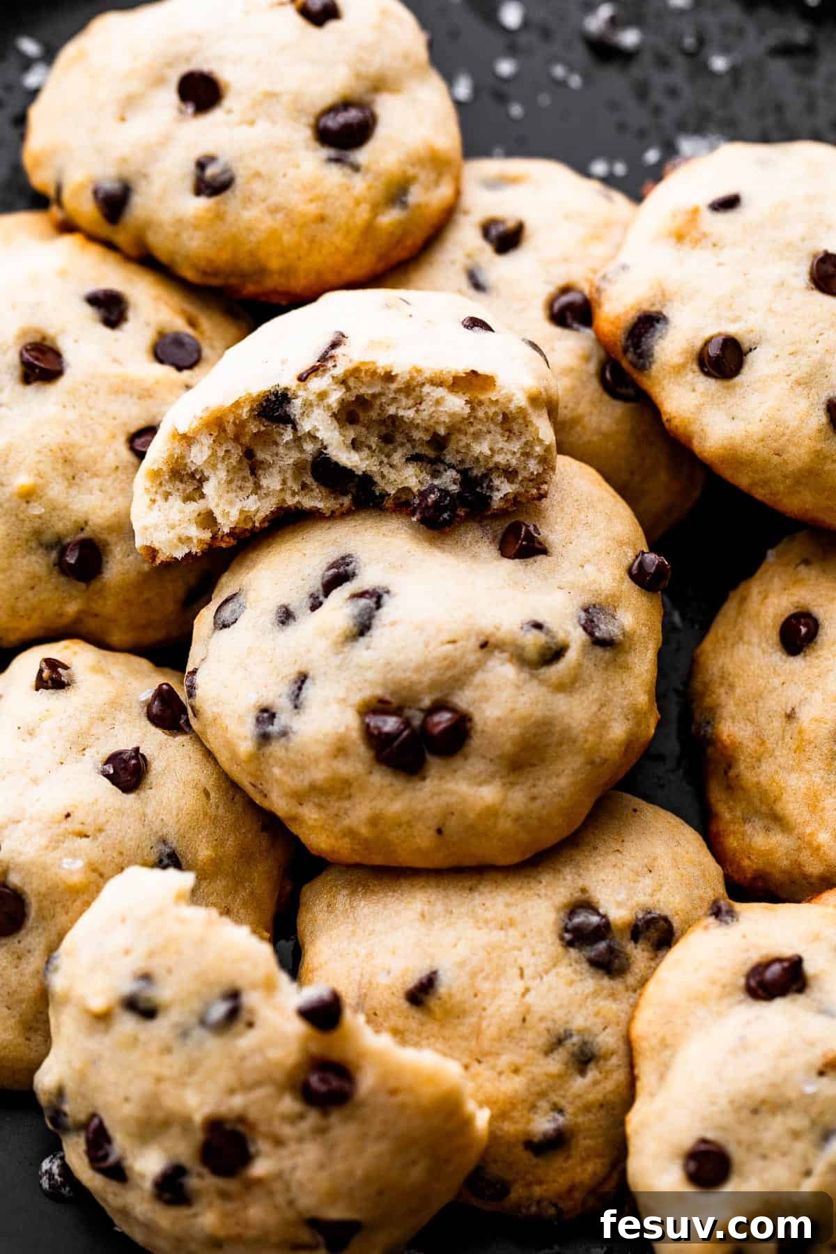 Golden Banana Chocolate Chip Cookies 7 overhead up close shot of banana chocolate chips cookies served on a black plate.