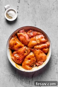 Velvety Peanut Butter Chicken 3 Boneless, skinless chicken thighs marinating in soy sauce.